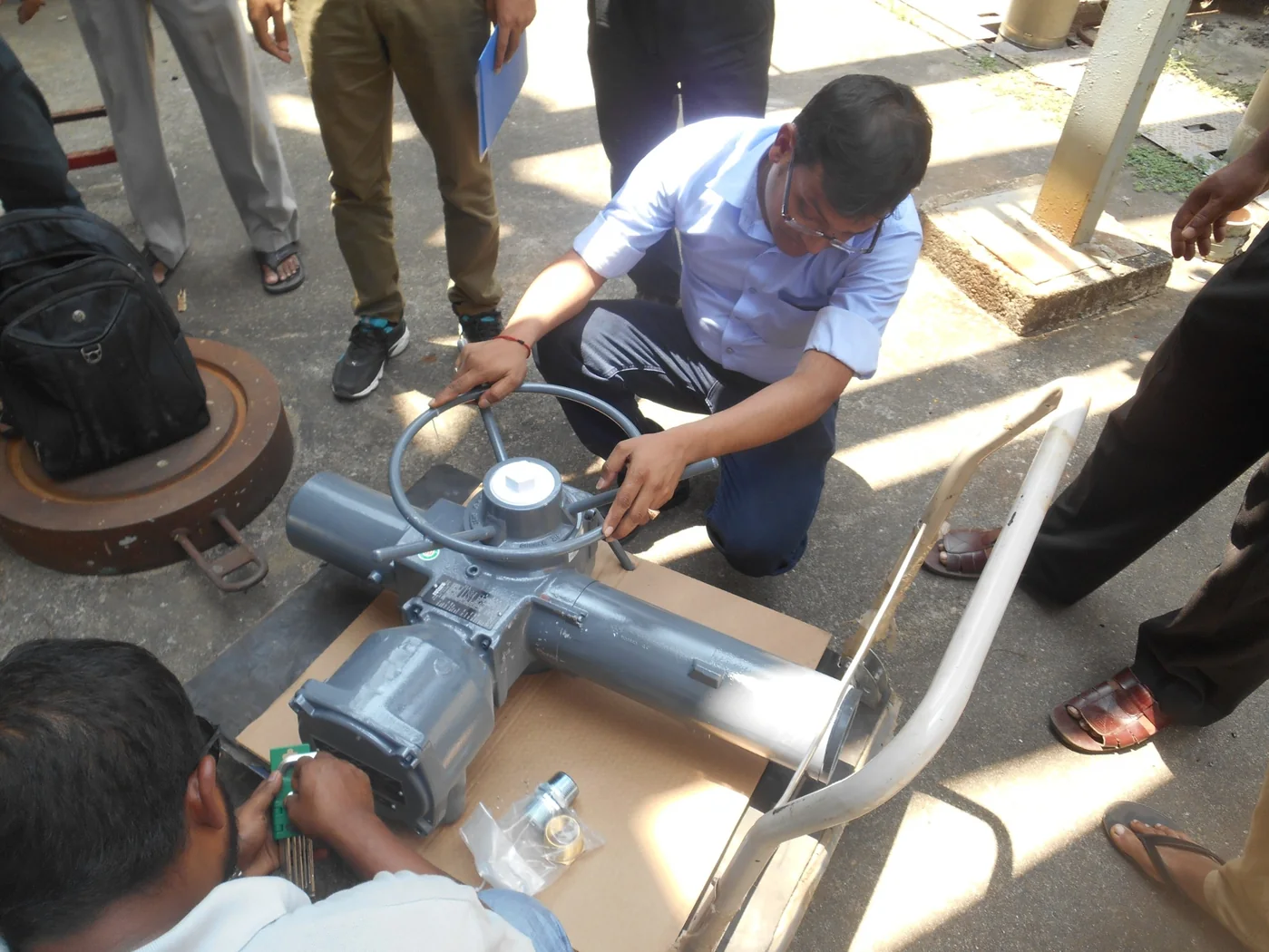 Impro Solutions team inspecting the imported Rotork actuator before CUFL site installation